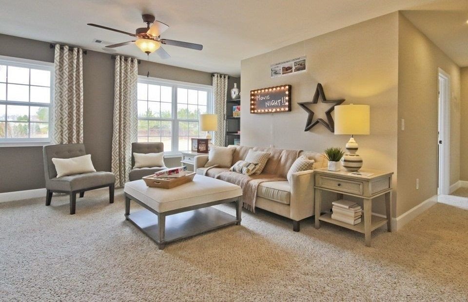 Living Room with Medium Beige Frieze Twisted Carpet